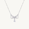Elegant Silver Bow Necklace with Sparkling Teardrop Pendant