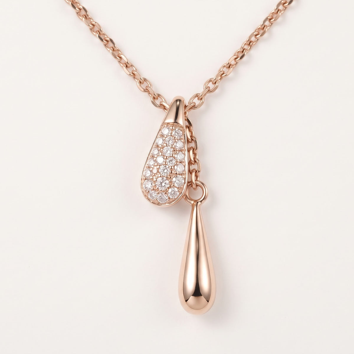 Rose Gold Teardrop Pendant Necklace with Sparkling Stones