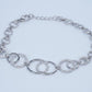 Silver Interlocking Circle Bracelet with Sparkling Accents