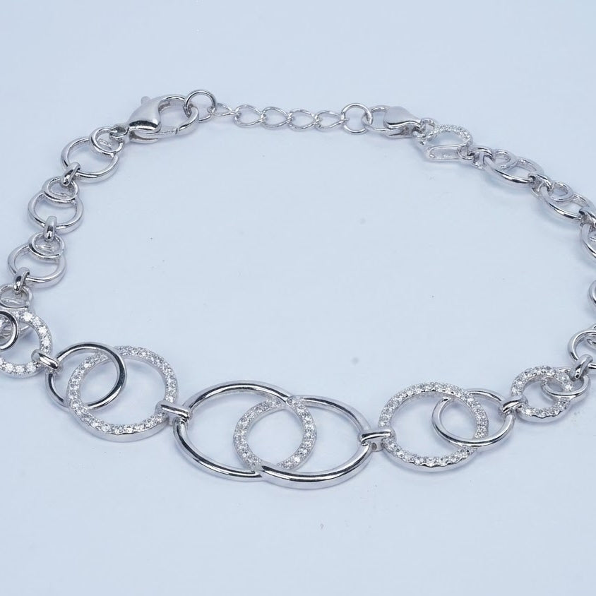 Silver Interlocking Circle Bracelet with Sparkling Accents