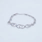 Silver Interlocking Circle Bracelet with Sparkling Accents