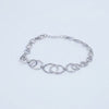 Silver Interlocking Circle Bracelet with Sparkling Accents