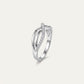 Elegant Silver Interwoven Pavé Ring with Curved Bands and Sparkling Detail