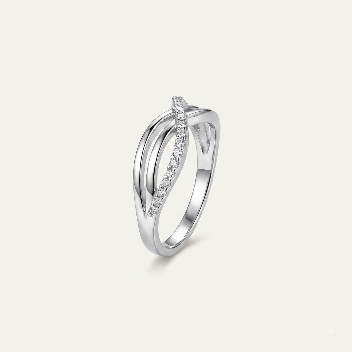 Elegant Silver Interwoven Pavé Ring with Curved Bands and Sparkling Detail