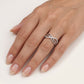 Elegant Silver Interwoven Pavé Ring with Curved Bands and Sparkling Detail