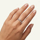 Elegant Silver Crystal Pavé Ring with Wave-Inspired Design