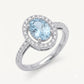Elegant Blue Oval Gemstone Halo Ring with Sparkling Stone Accents