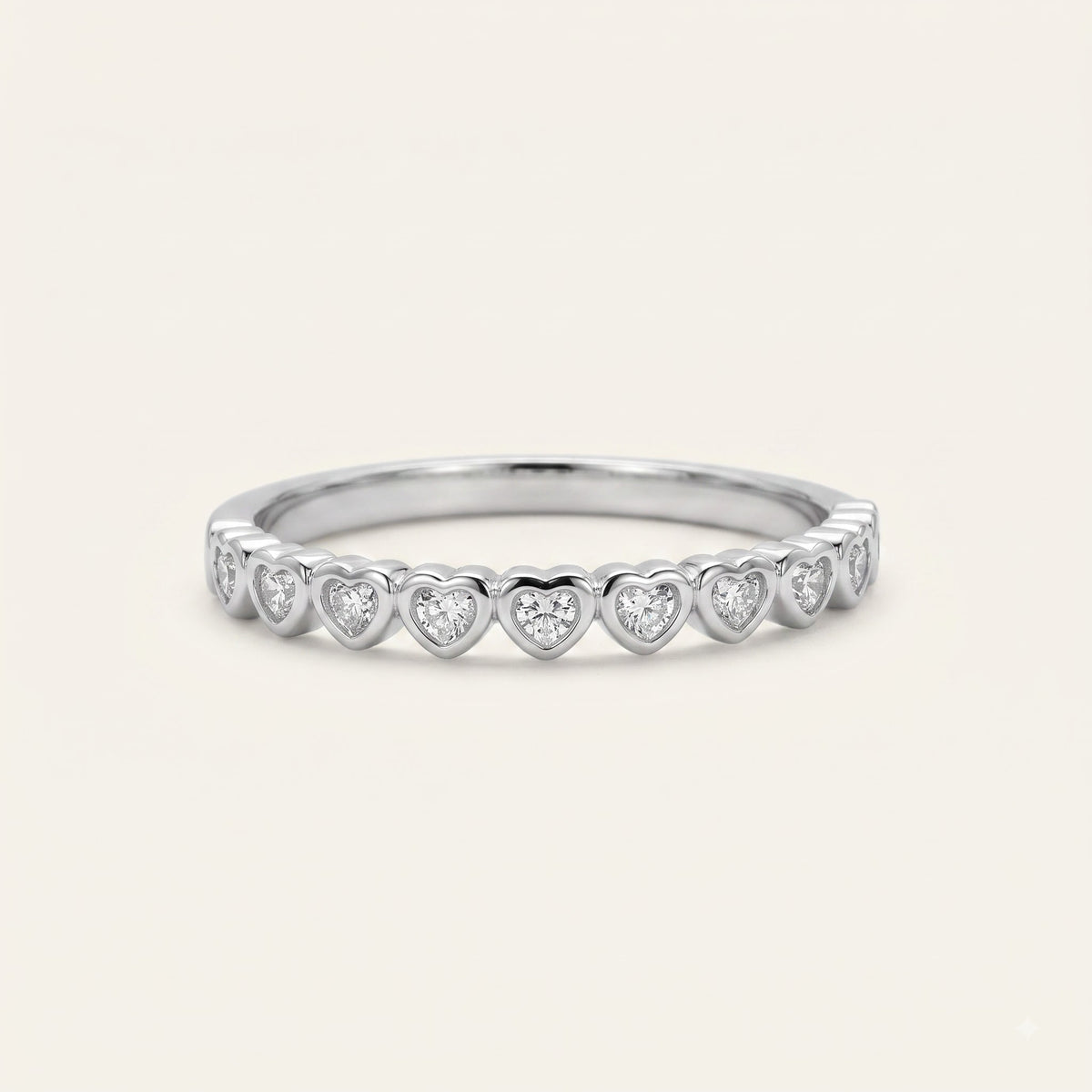Elegant Heart-Shaped Stone Half Eternity Ring with Polished Silver-Tone Band