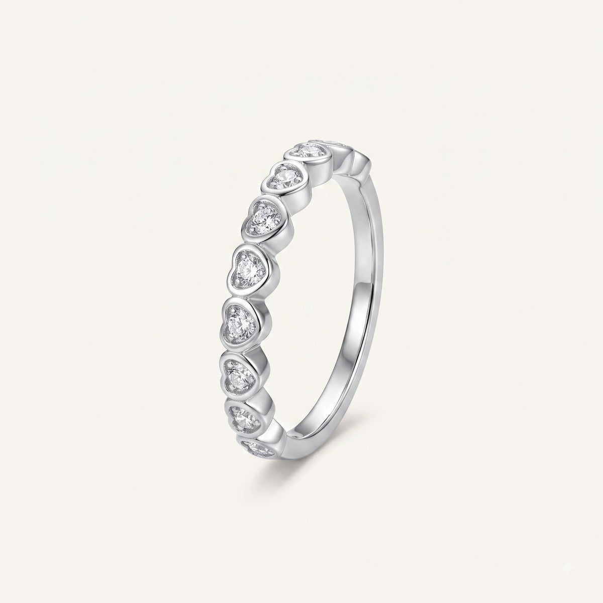 Elegant Heart-Shaped Stone Half Eternity Ring with Polished Silver-Tone Band