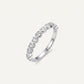 Elegant Heart-Shaped Stone Half Eternity Ring with Polished Silver-Tone Band