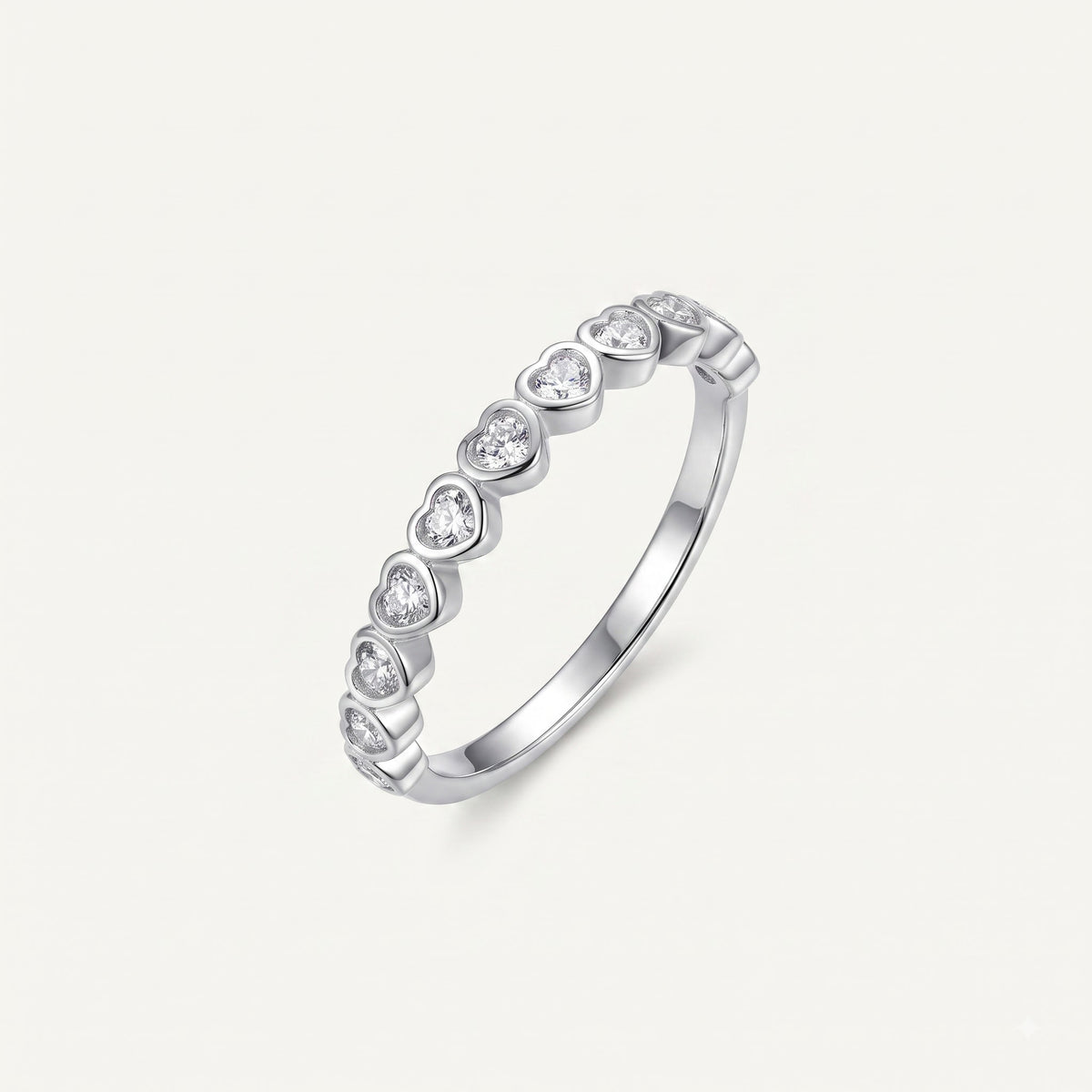 Elegant Heart-Shaped Stone Half Eternity Ring with Polished Silver-Tone Band