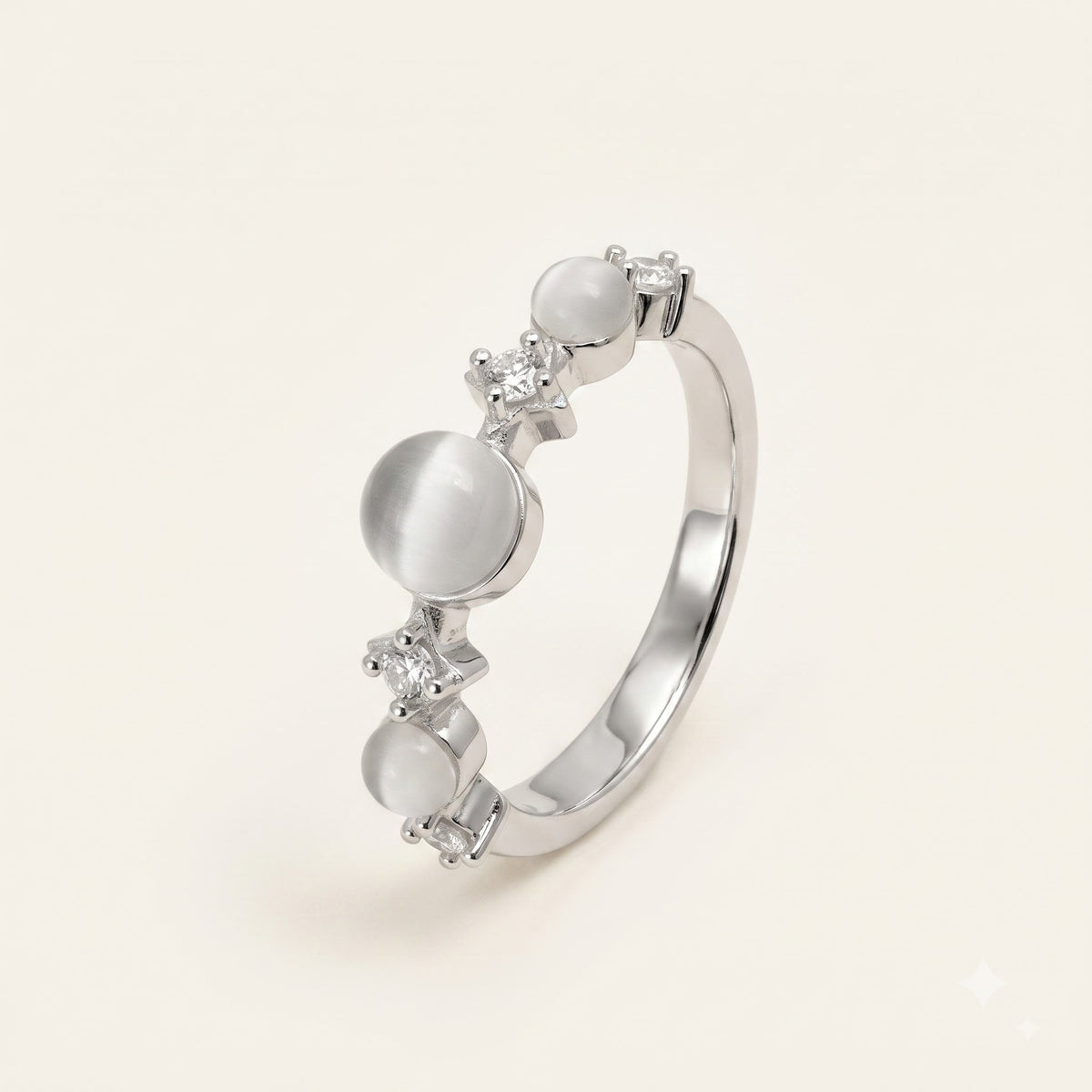 Elegant Silver Ring with White Cat Eye-Style Stones & Crystal Accents