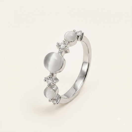 Elegant Silver Ring with White Cat Eye-Style Stones & Crystal Accents