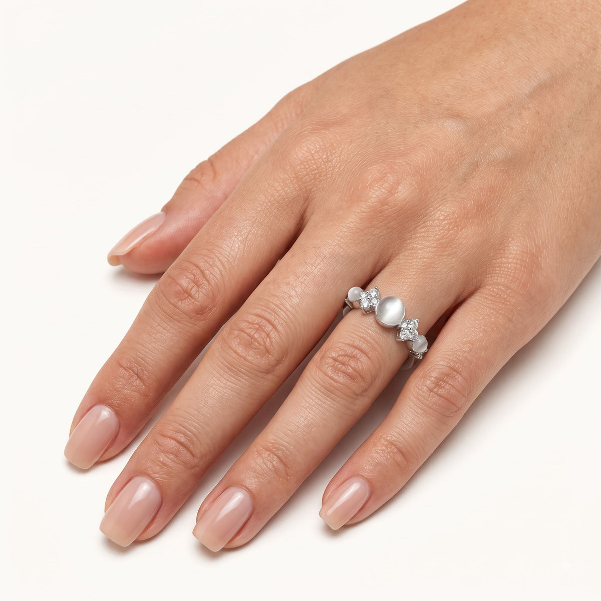 Elegant Silver Ring with White Cat Eye-Style Stones & Crystal Accents