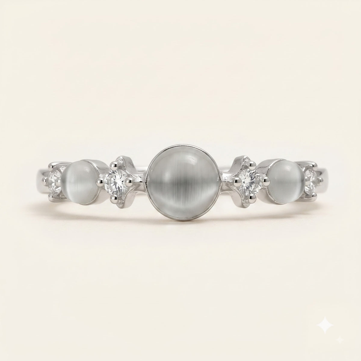 Elegant Silver Ring with White Cat Eye-Style Stones & Crystal Accents