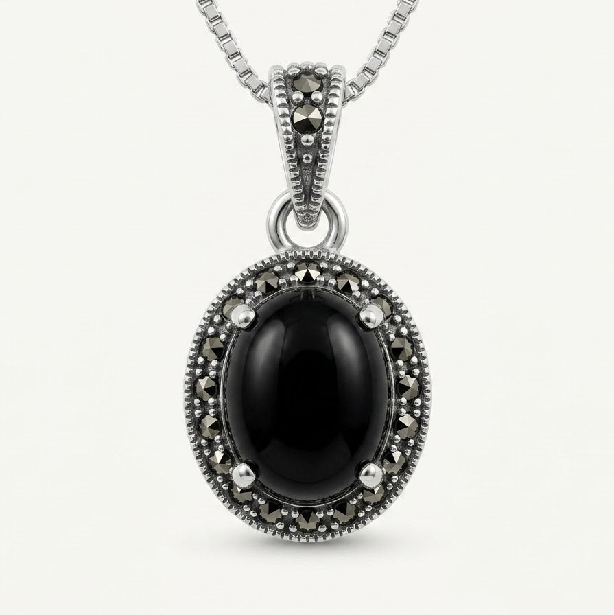 Black Oval Stone Pendant Necklace with Sparkling Silver Detailing