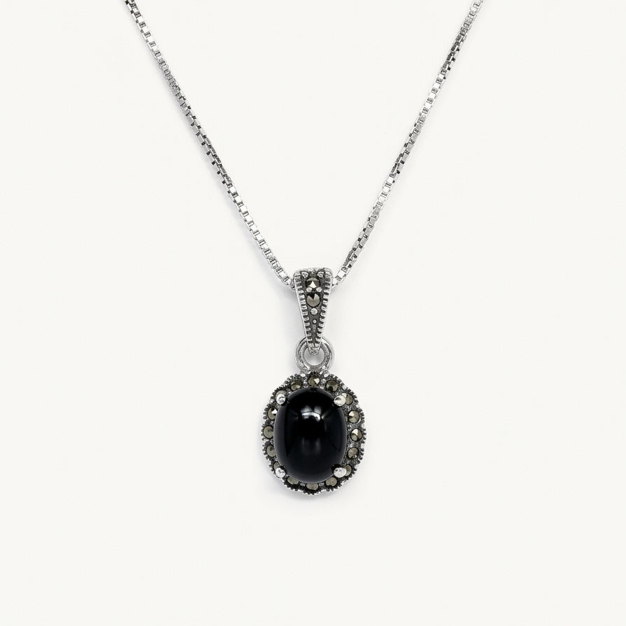 Black Oval Stone Pendant Necklace with Sparkling Silver Detailing